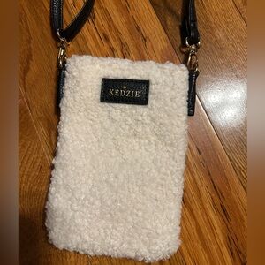 Women’s Crossbody phone holder / small purse.Adjustable black strap. Snap close